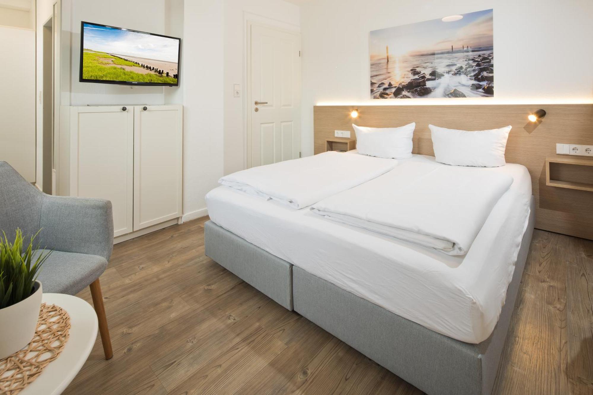 Haus Menno Janssen - Doppelzimmer Norderney Buitenkant foto